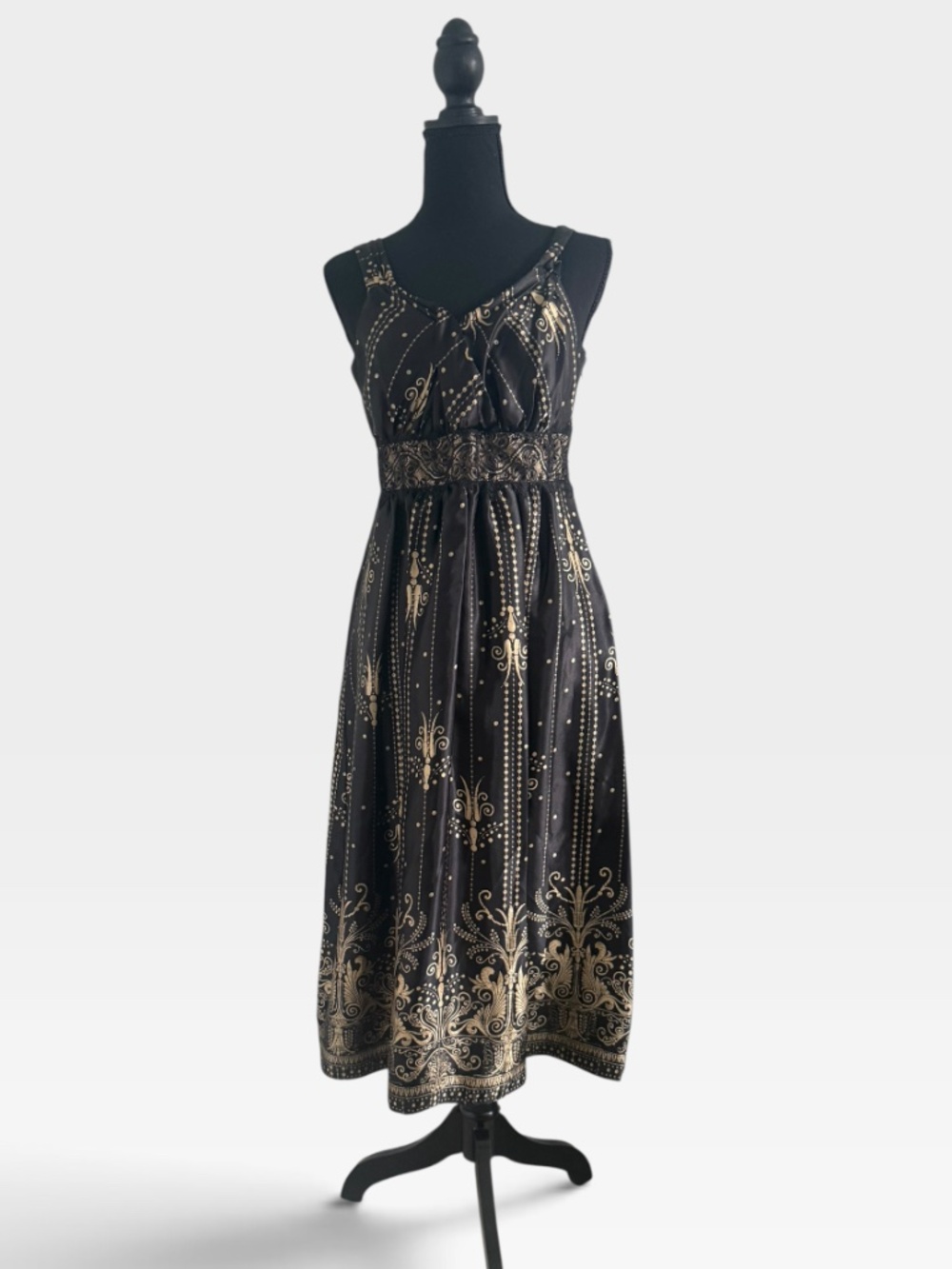 black dress with gold designs